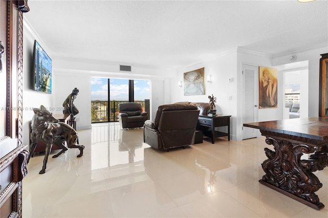 living area featuring light tile patterned floors, visible vents, and crown molding