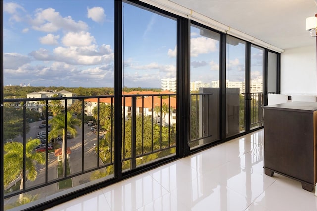 unfurnished sunroom with a view of city