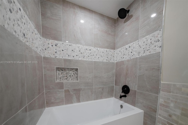 17329 Birchwood Ln Unit A, Fort Myers, FL 33908 - bathroom featuring tile walls, a tub, and a shower