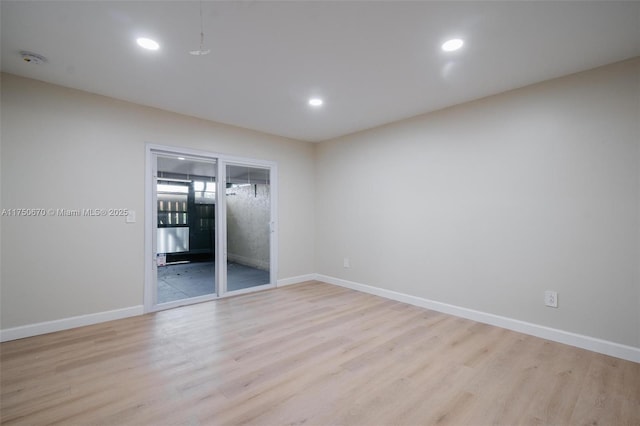 17329 Birchwood Ln Unit A, Fort Myers, FL 33908 - unfurnished bedroom featuring baseboards, light wood finished floors, and recessed lighting