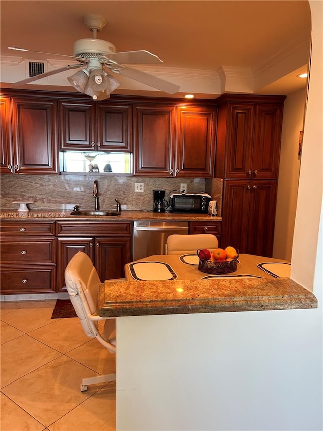 kitchen with light tile patterned flooring, a sink, ornamental molding, decorative backsplash, and dishwasher