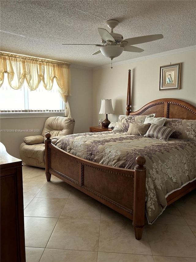 bedroom with light tile patterned floors, ceiling fan, a textured ceiling, and crown molding