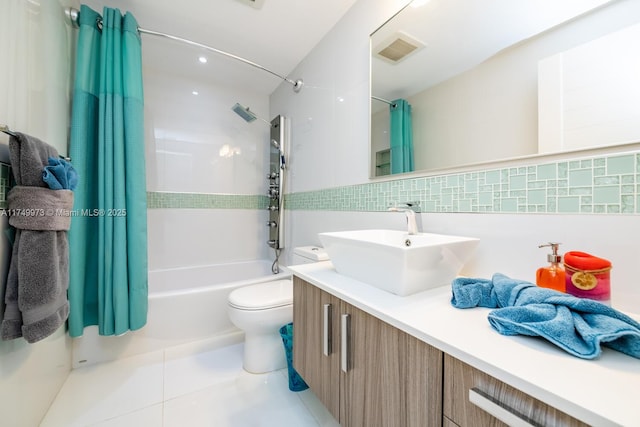 full bathroom featuring tile patterned flooring, vanity, visible vents, decorative backsplash, and shower / tub combo with curtain