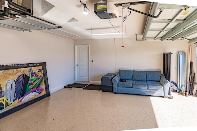 garage with baseboards and a garage door opener