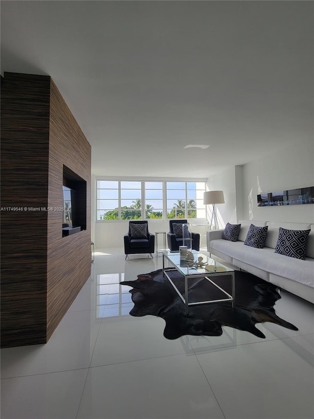 living area with light tile patterned floors