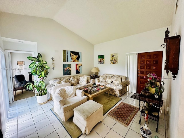 living room featuring lofted ceiling and light tile patterned floors