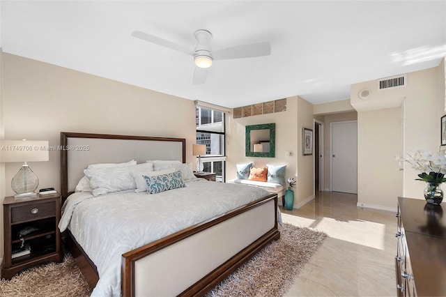 bedroom featuring baseboards, visible vents, and a ceiling fan