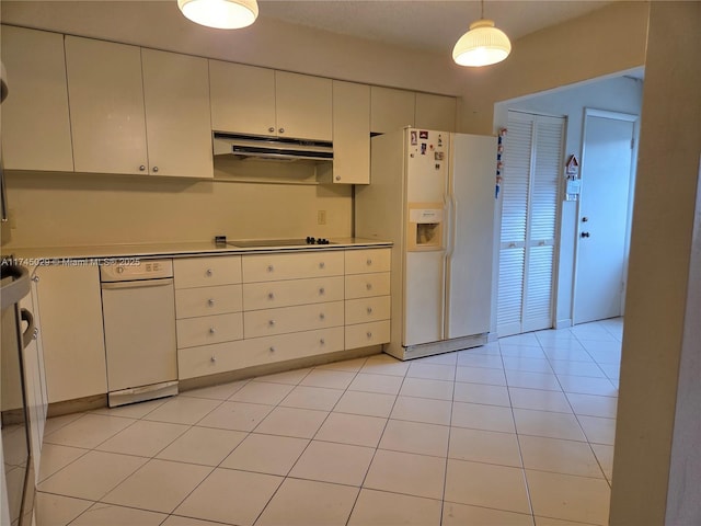 kitchen featuring white fridge with ice dispenser, light countertops, under cabinet range hood, and white cabinetry