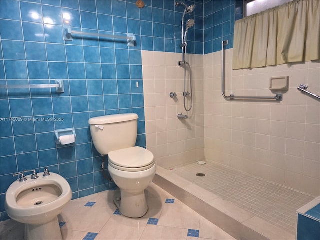 bathroom featuring a stall shower, a bidet, tile patterned flooring, and toilet