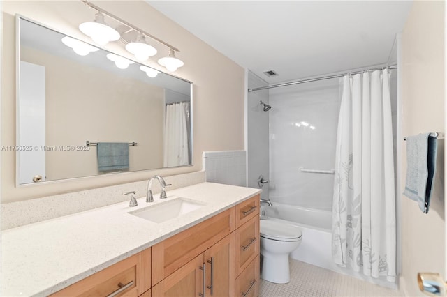 bathroom featuring tile patterned flooring, toilet, visible vents, vanity, and shower / bath combo with shower curtain