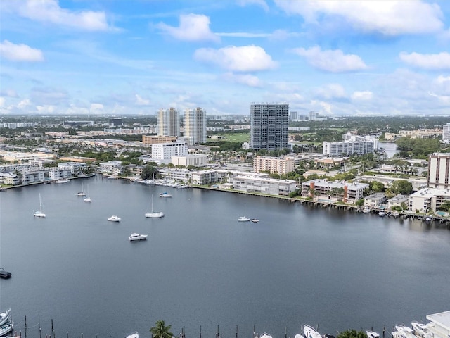 drone / aerial view with a water view and a view of city