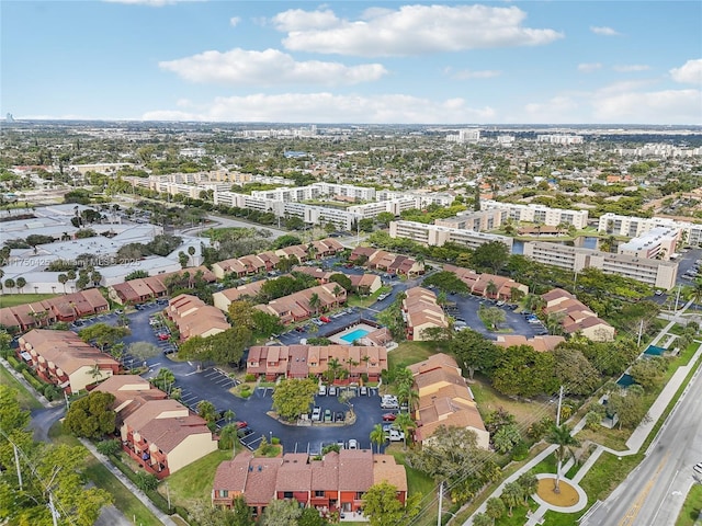 birds eye view of property with a city view