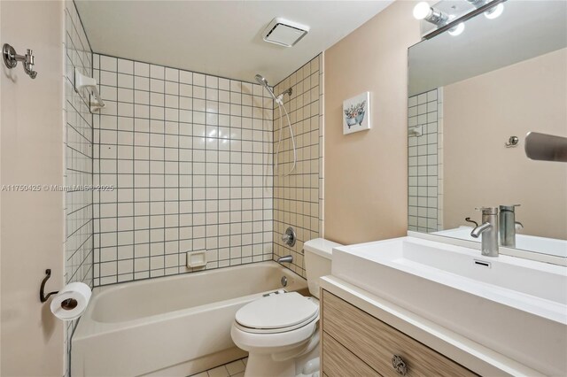 full bath featuring vanity, toilet, and shower / bath combination