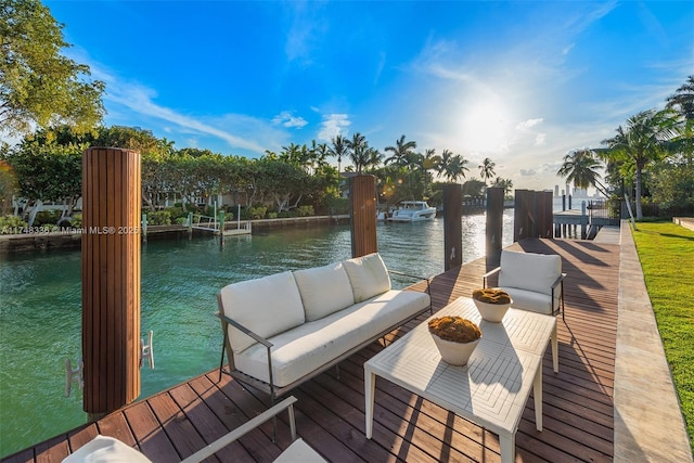 view of dock featuring a water view and an outdoor living space