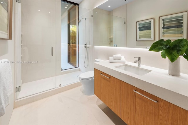 full bathroom featuring tile patterned flooring, a shower stall, toilet, and vanity