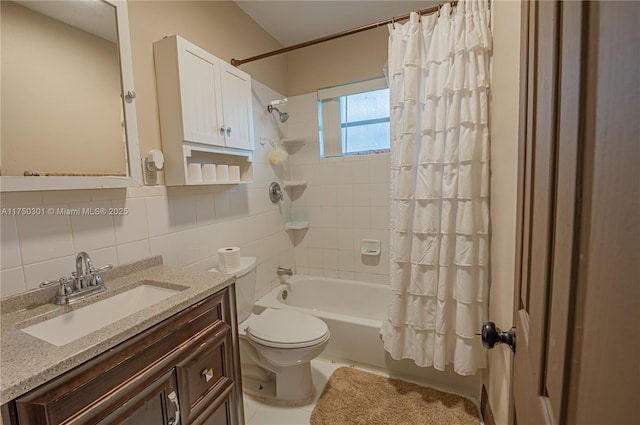 bathroom with toilet, vanity, tile walls, backsplash, and shower / bath combination with curtain