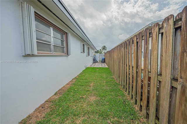 view of yard featuring fence