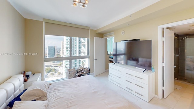 bedroom featuring expansive windows