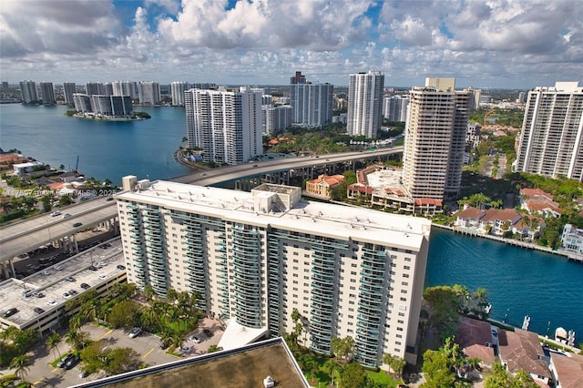 aerial view with a view of city and a water view