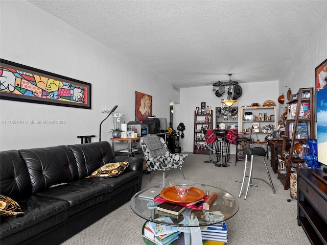 19390 Collins Ave Unit Ph-24, Sunny Isles Beach, FL 33160 - living room featuring a textured ceiling and carpet