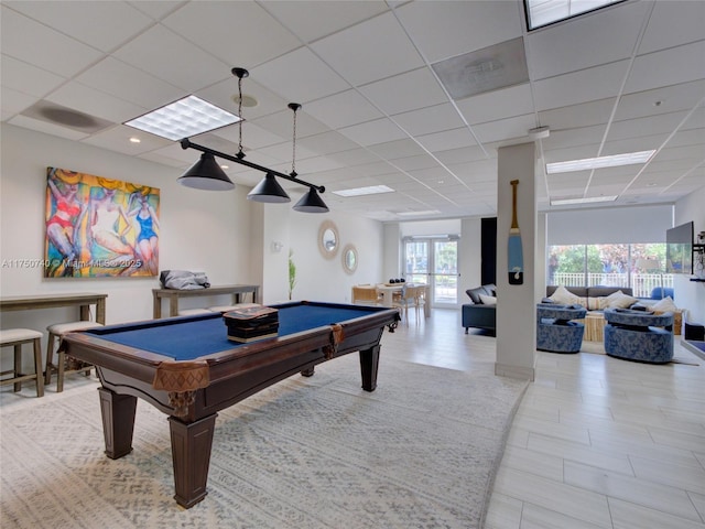 recreation room featuring billiards and a drop ceiling