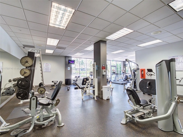 gym featuring a drop ceiling