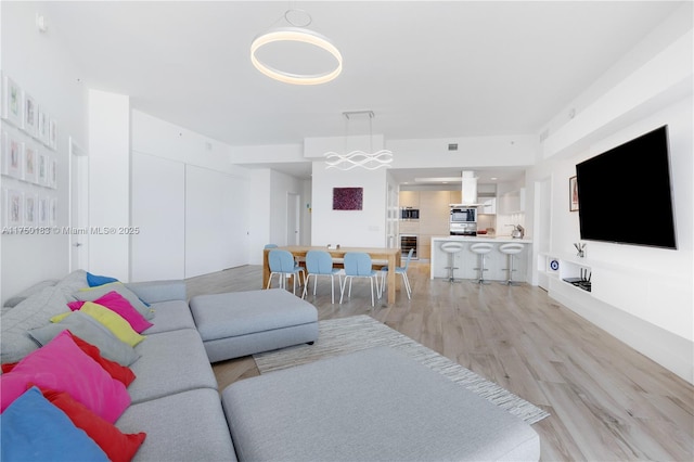 living area with light wood finished floors