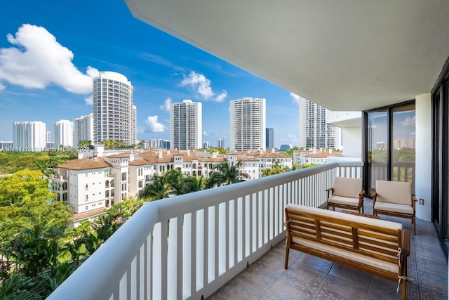 balcony featuring a city view