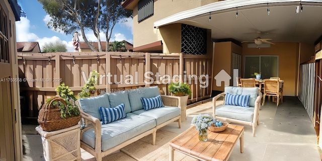 view of patio featuring outdoor lounge area and ceiling fan