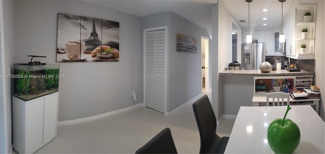 dining space with baseboards, visible vents, and recessed lighting