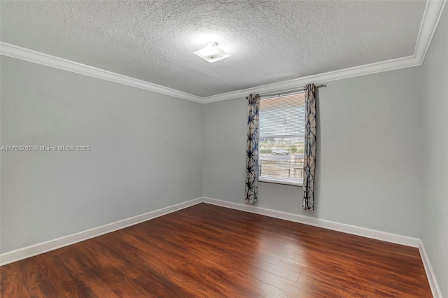 unfurnished room featuring crown molding, dark wood finished floors, a textured ceiling, and baseboards