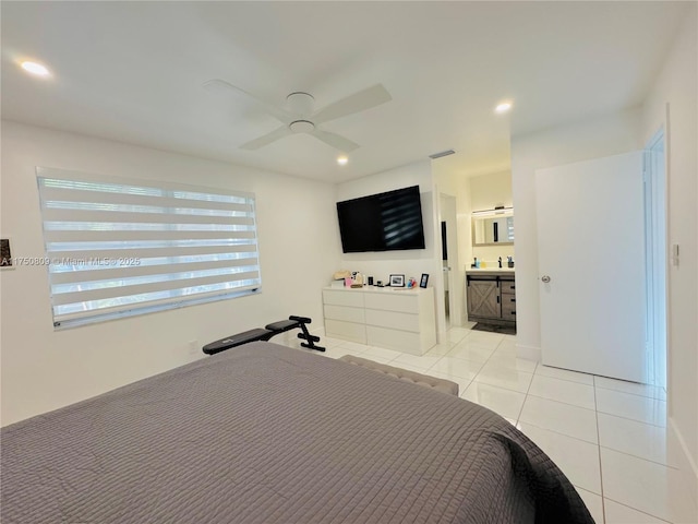 bedroom with light tile patterned floors, ceiling fan, connected bathroom, and recessed lighting