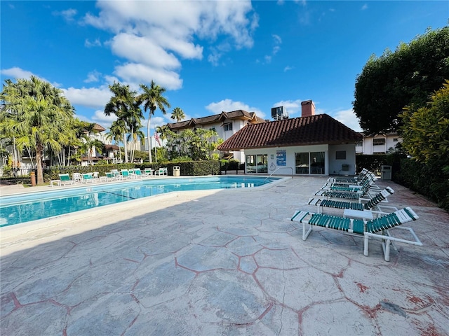 pool featuring a patio area