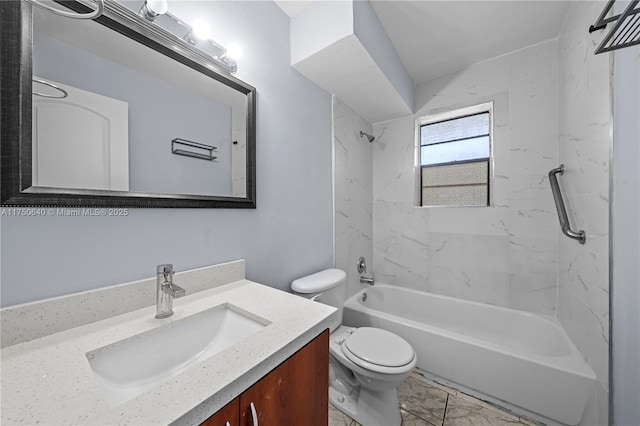 bathroom with washtub / shower combination, marble finish floor, toilet, and vanity