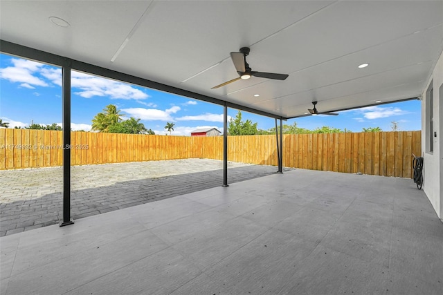 view of patio with ceiling fan and a fenced backyard