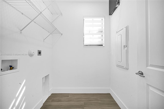 laundry room featuring laundry area, washer hookup, baseboards, dark wood-style floors, and electric dryer hookup