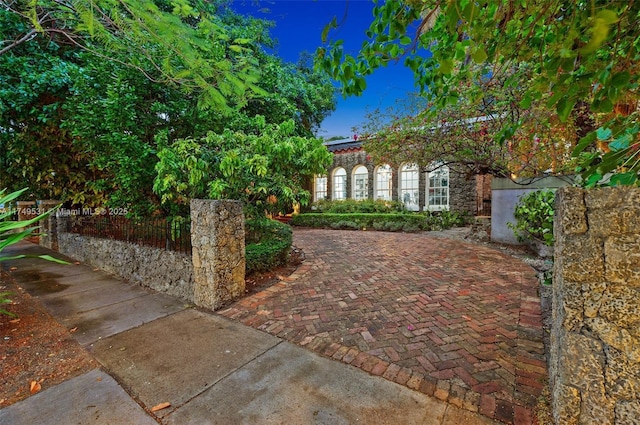 view of front of house with fence