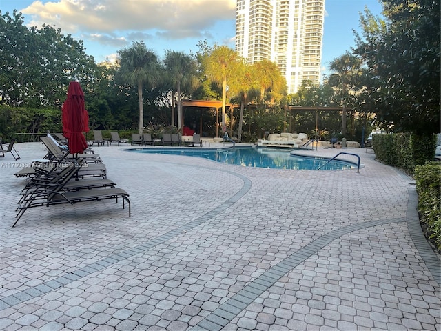 community pool featuring a patio