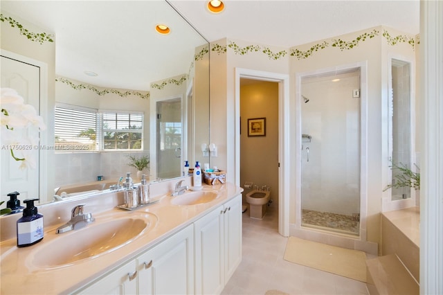 full bath with tile patterned floors, a bidet, a sink, and a shower stall