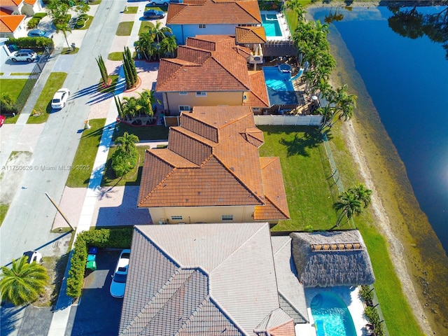 drone / aerial view with a water view