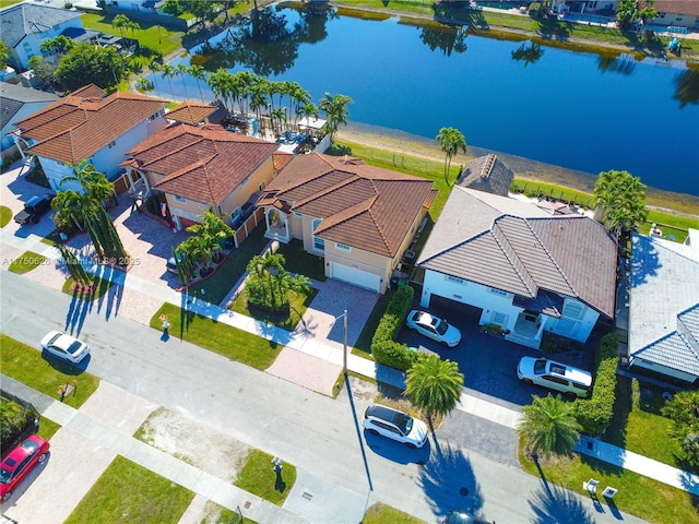 aerial view featuring a water view and a residential view