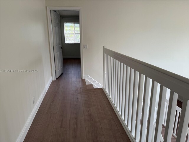 3962 Pinewood Ln, Weston, FL 33331 - hallway with dark wood-style floors and baseboards