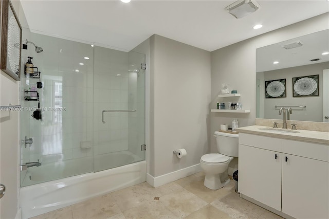 bathroom with toilet, shower / bath combination with glass door, vanity, baseboards, and tile patterned floors