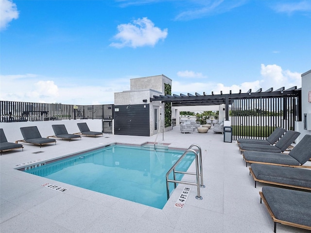 community pool with fence, a pergola, and a patio