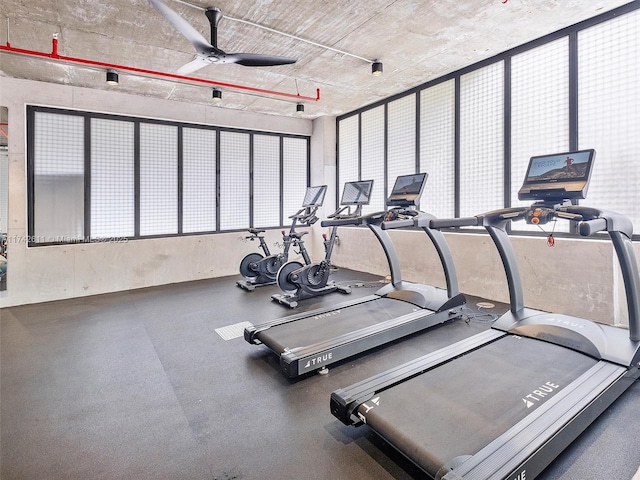 workout area featuring ceiling fan