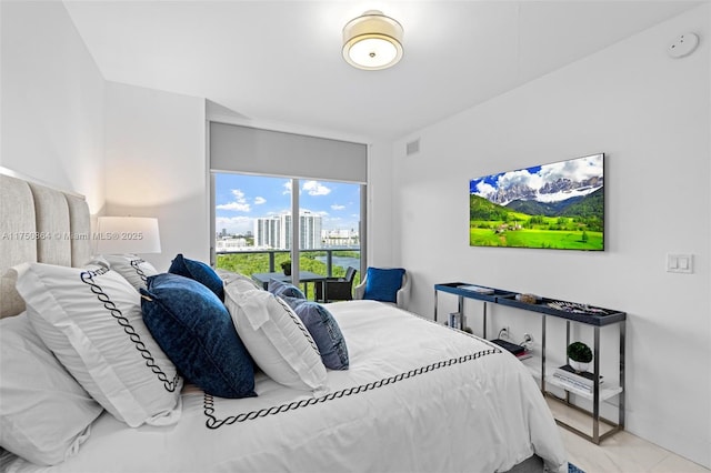 bedroom featuring visible vents