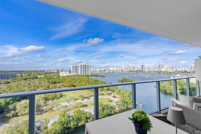 balcony with a city view and a water view