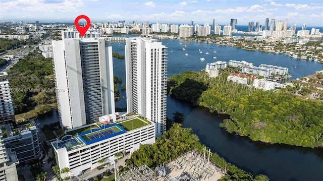 bird's eye view with a view of city and a water view