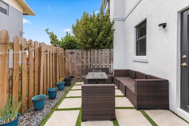 view of patio / terrace featuring outdoor lounge area and a fenced backyard