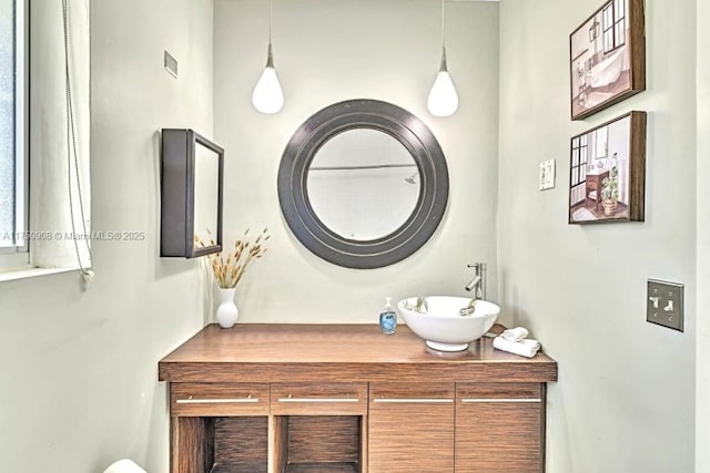 bathroom with visible vents and vanity